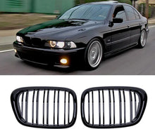 Dual slat kidney grilles on car