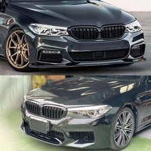 Dual slat kidney grilles on car