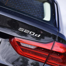 Trunk letters silver on car
