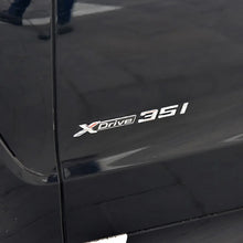Trunk letters silver on car